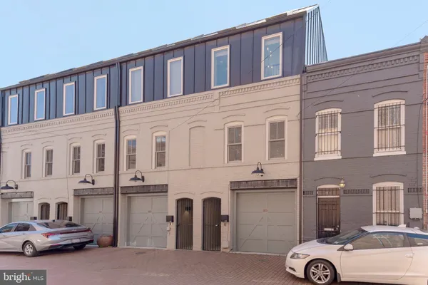a car parked in front of a building