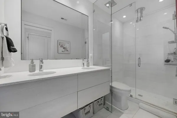 a bathroom with a sink and mirror