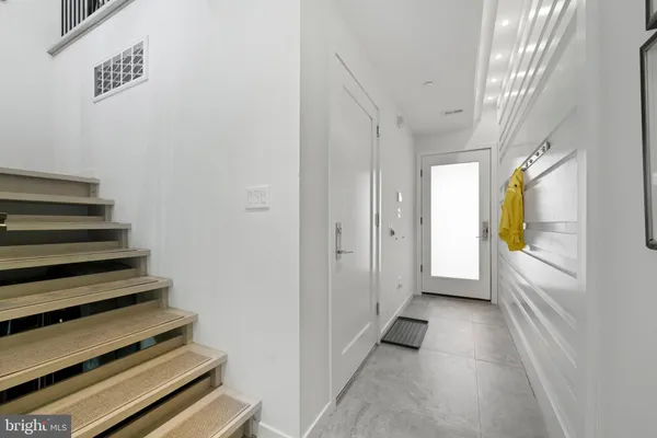 a view of walk in closet with window