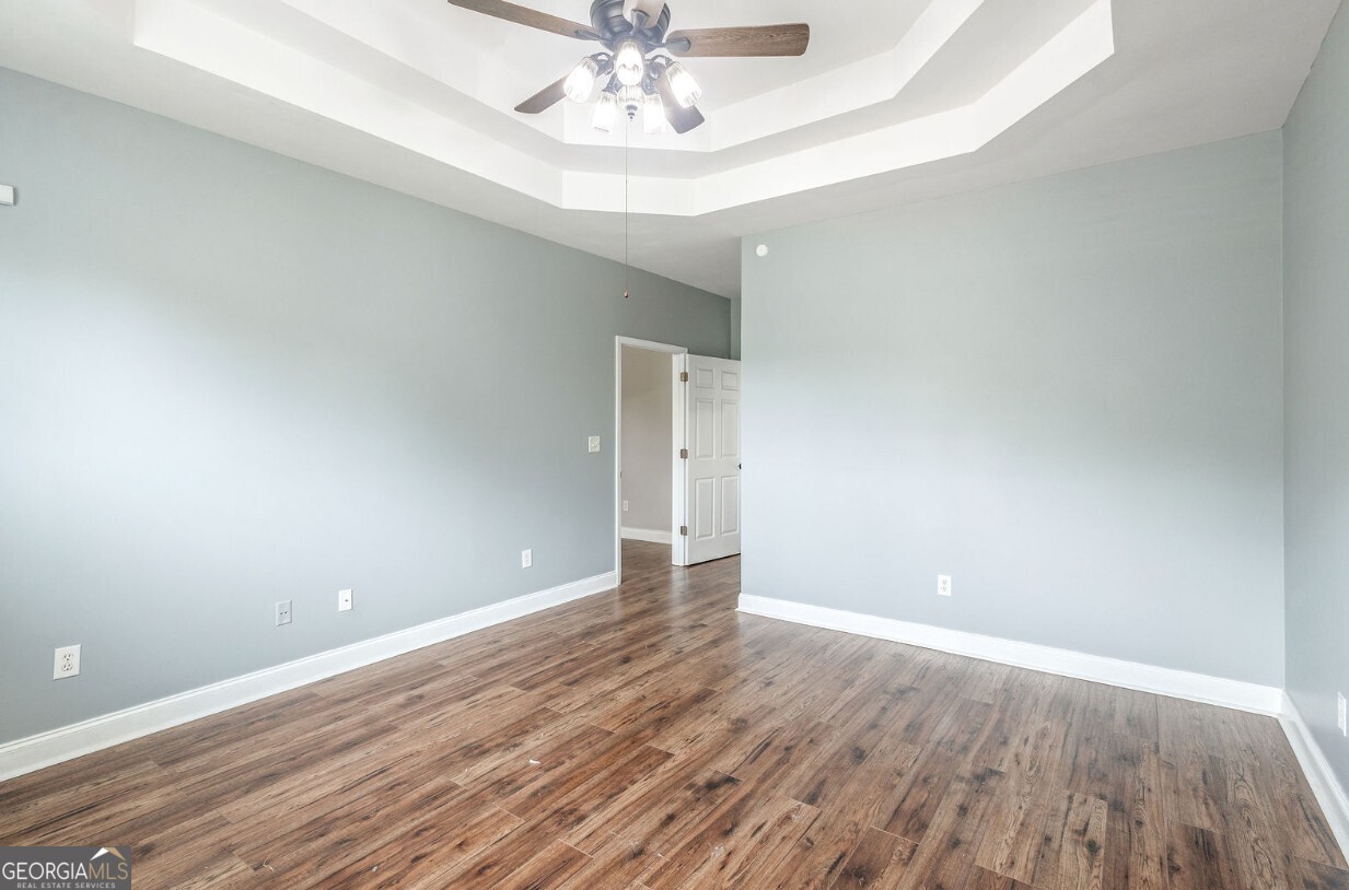 82 Newton Road LaGrange, GA 30240 - Photo 22 of 45 a view of an empty room with wooden floor