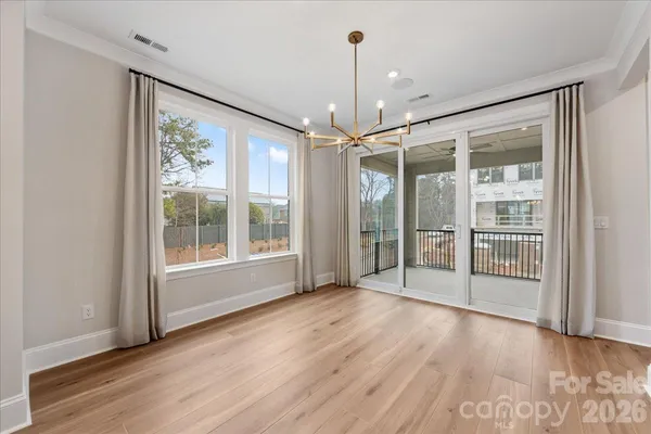 a view of a room with windows