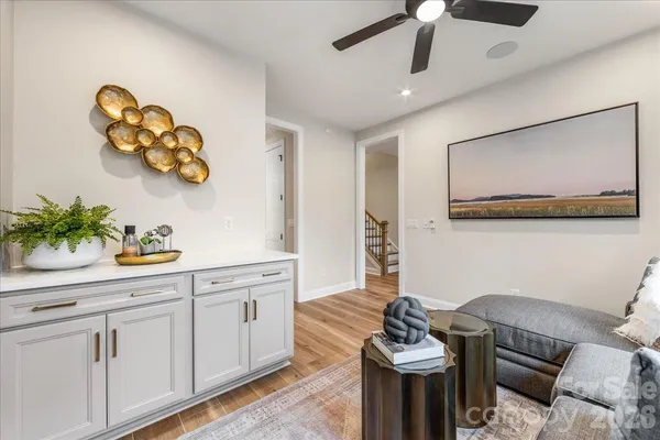 a en suite bathroom with a sink and a mirror