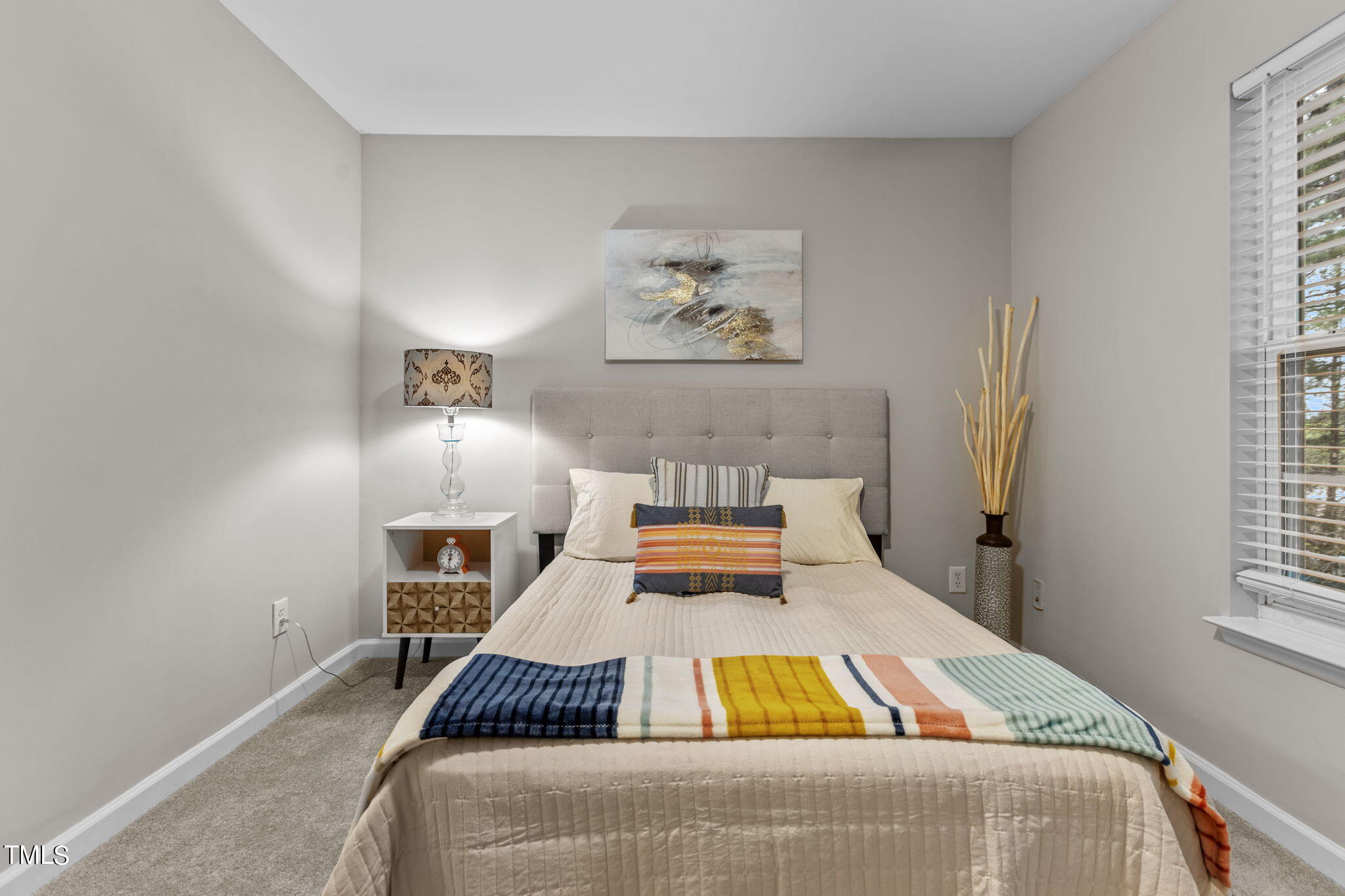 138 Blue Crest Lane Durham, NC 27705 - Photo 13 of 28 a bedroom with a bed and window