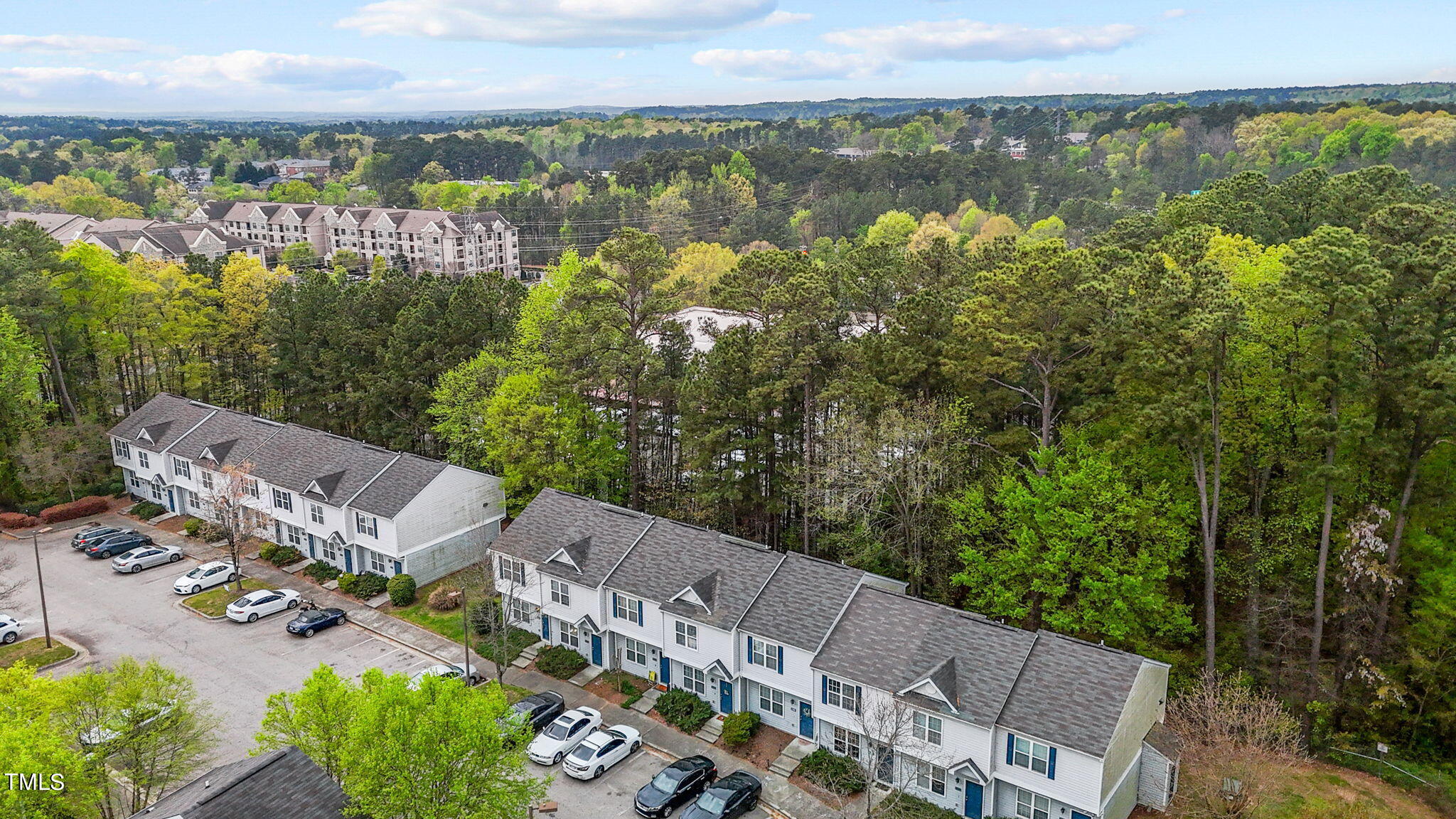 138 Blue Crest Lane Durham, NC 27705 - Photo 19 of 28 a view of a lake with a city