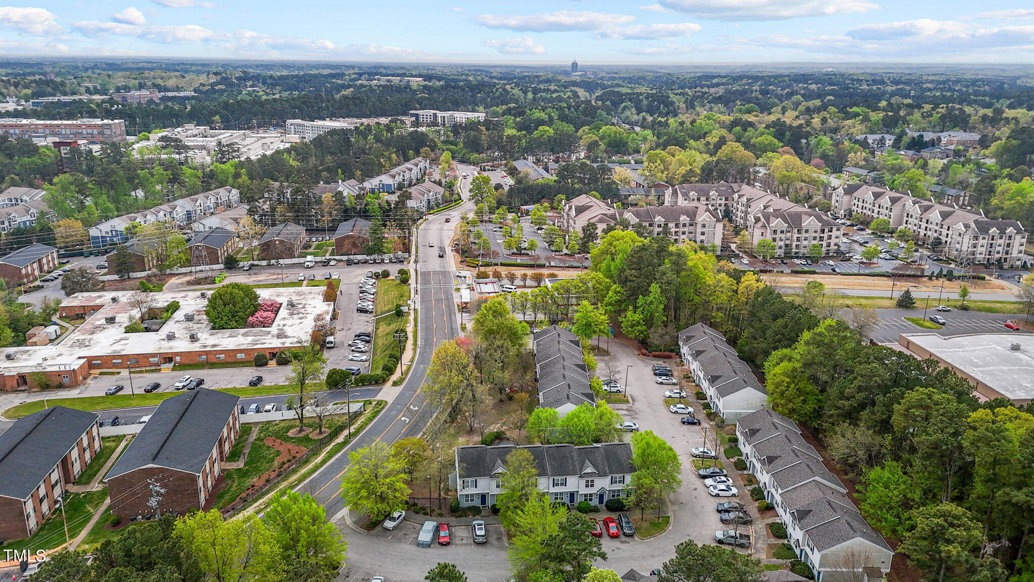 138 Blue Crest Lane Durham, NC 27705 - Photo 22 of 28 an aerial view of residential building and lake