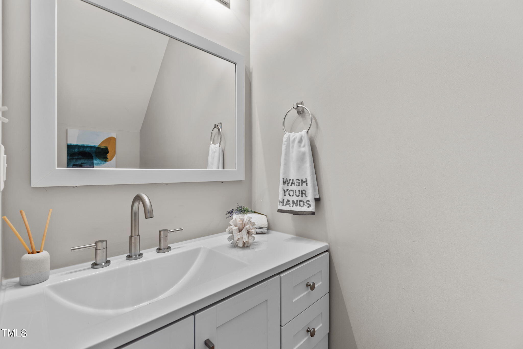 138 Blue Crest Lane Durham, NC 27705 - Photo 6 of 28 a bathroom with a sink and a mirror