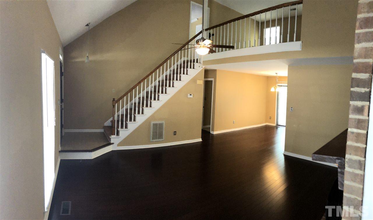 11812 North Exeter Way Raleigh, NC 27613 - Photo 3 of 25 a view of entryway with wooden floor