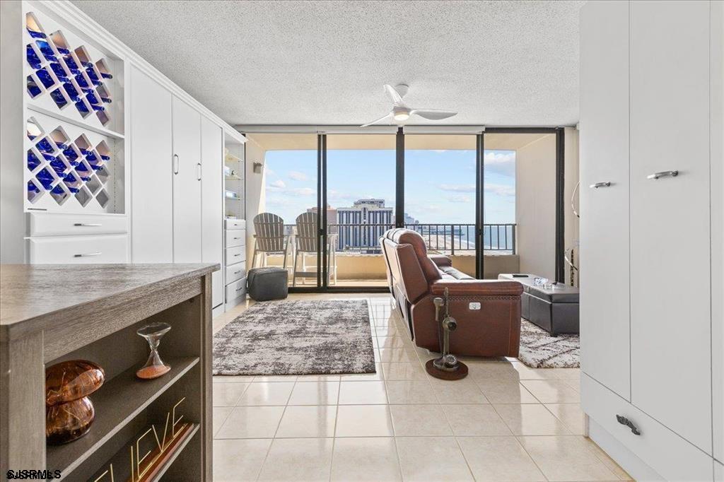 3851 Boardwalk, Unit 2005 Atlantic City, NJ 08401 - Photo 22 of 28 a living room with furniture and large windows