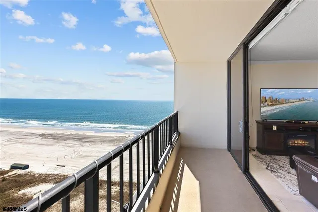 a view of balcony with furniture