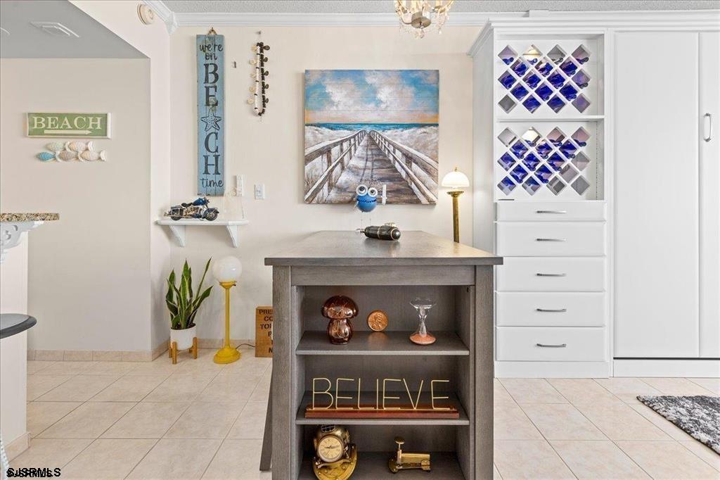 3851 Boardwalk, Unit 2005 Atlantic City, NJ 08401 - Photo 10 of 28 a living room with furniture and a fireplace