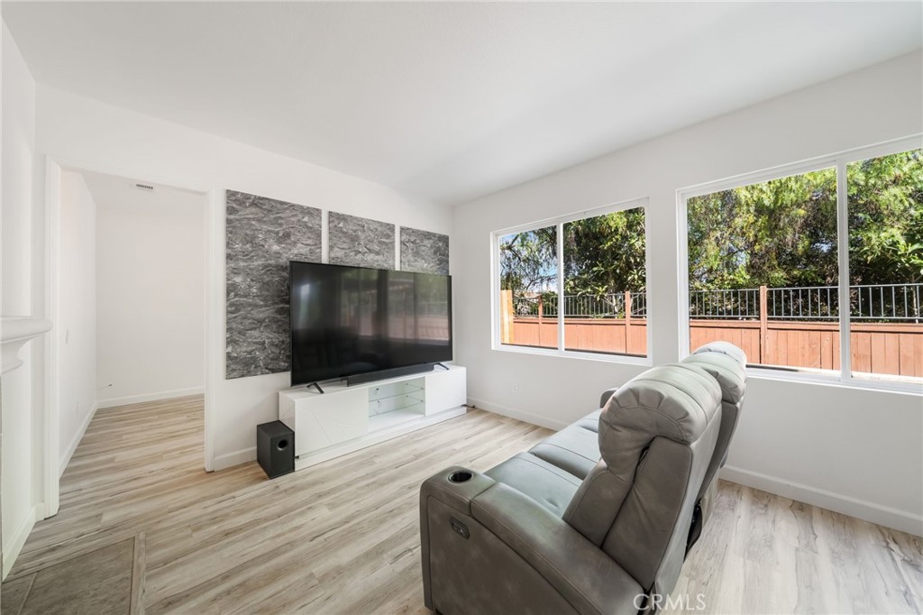 1729 Bridlevale Road Chula Vista, CA 91913 - Photo 13 of 44 a living room with furniture and a flat screen tv