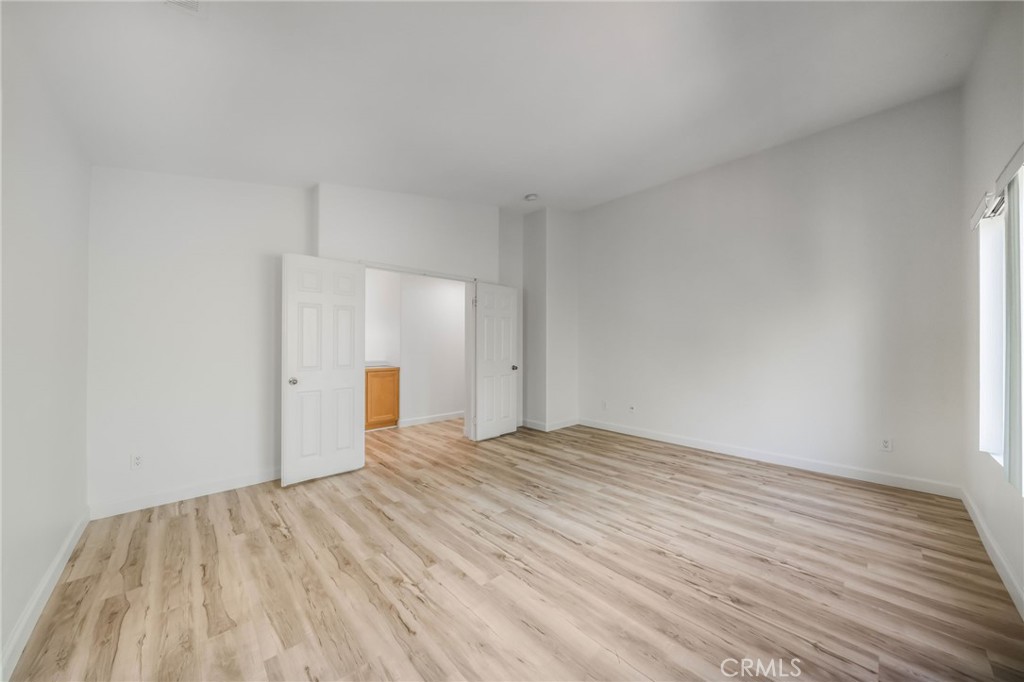 1729 Bridlevale Road Chula Vista, CA 91913 - Photo 19 of 44 a view of empty room with wooden floor