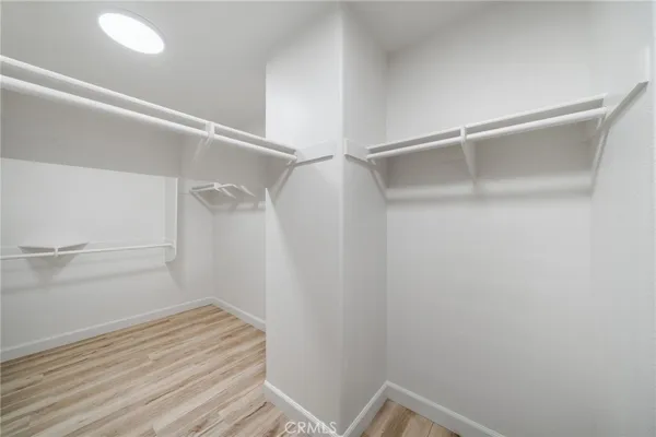 a view of an empty walk in closet