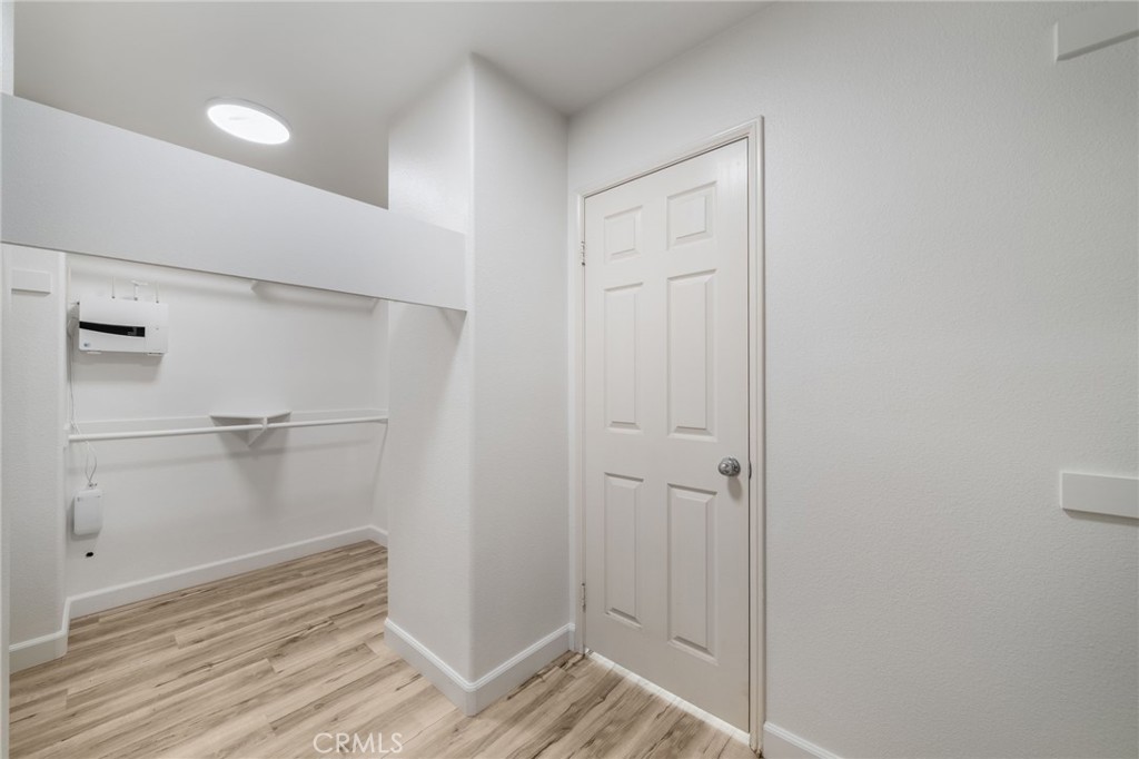 1729 Bridlevale Road Chula Vista, CA 91913 - Photo 24 of 44 a view of a room with wooden floor