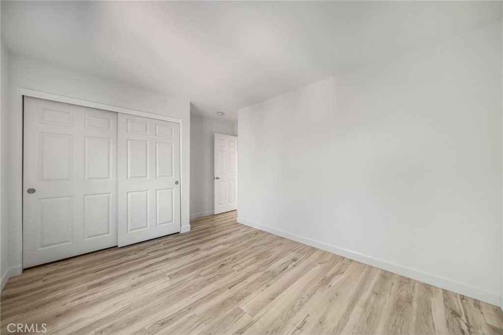 1729 Bridlevale Road Chula Vista, CA 91913 - Photo 28 of 44 a view of an empty room and wooden floor
