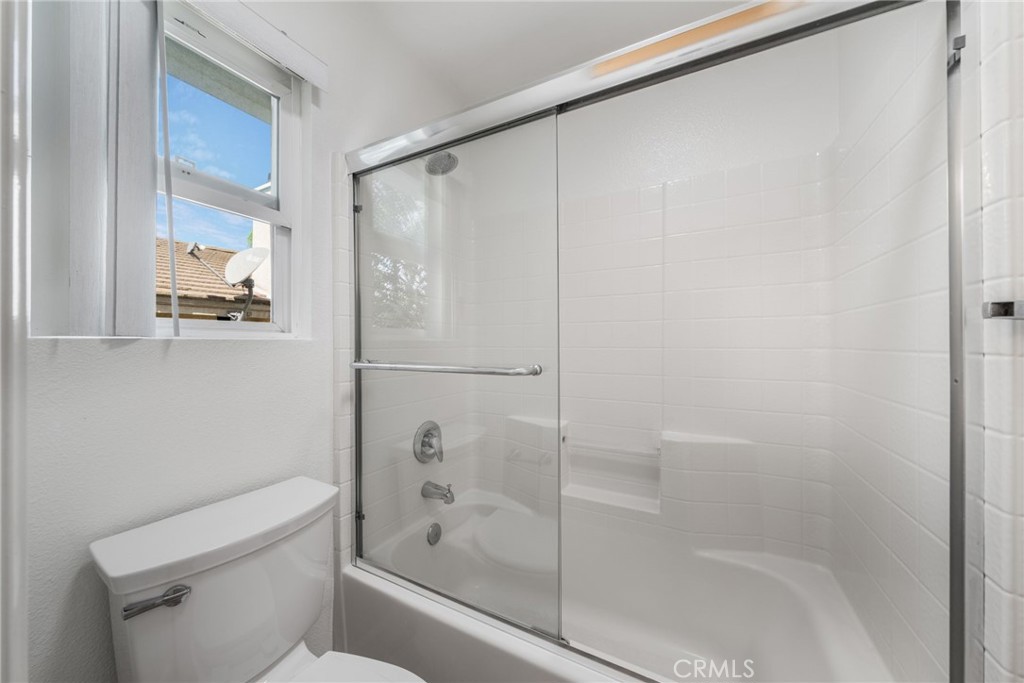 1729 Bridlevale Road Chula Vista, CA 91913 - Photo 32 of 44 a bathroom with a shower and a toilet