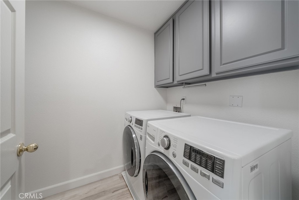 1729 Bridlevale Road Chula Vista, CA 91913 - Photo 33 of 44 a utility room with dryer and washer