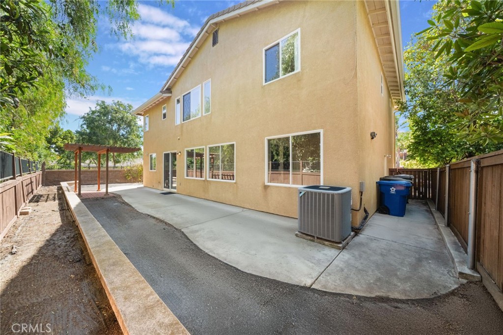 1729 Bridlevale Road Chula Vista, CA 91913 - Photo 35 of 44 a backyard of a house with barbeque oven and outdoor seating