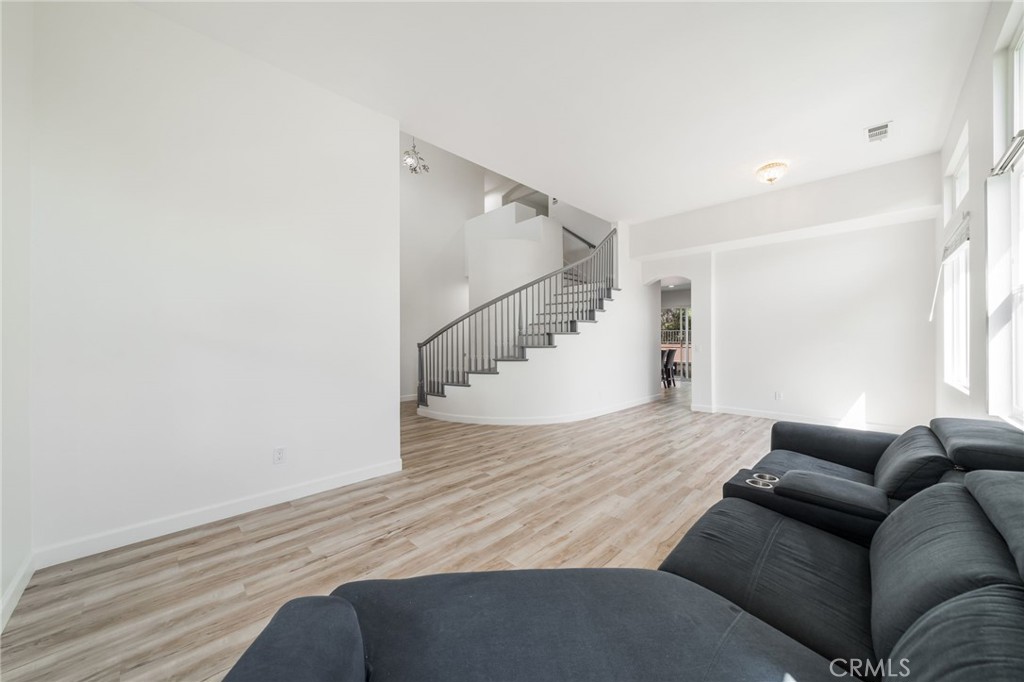 1729 Bridlevale Road Chula Vista, CA 91913 - Photo 5 of 44 a living room with furniture and stairs