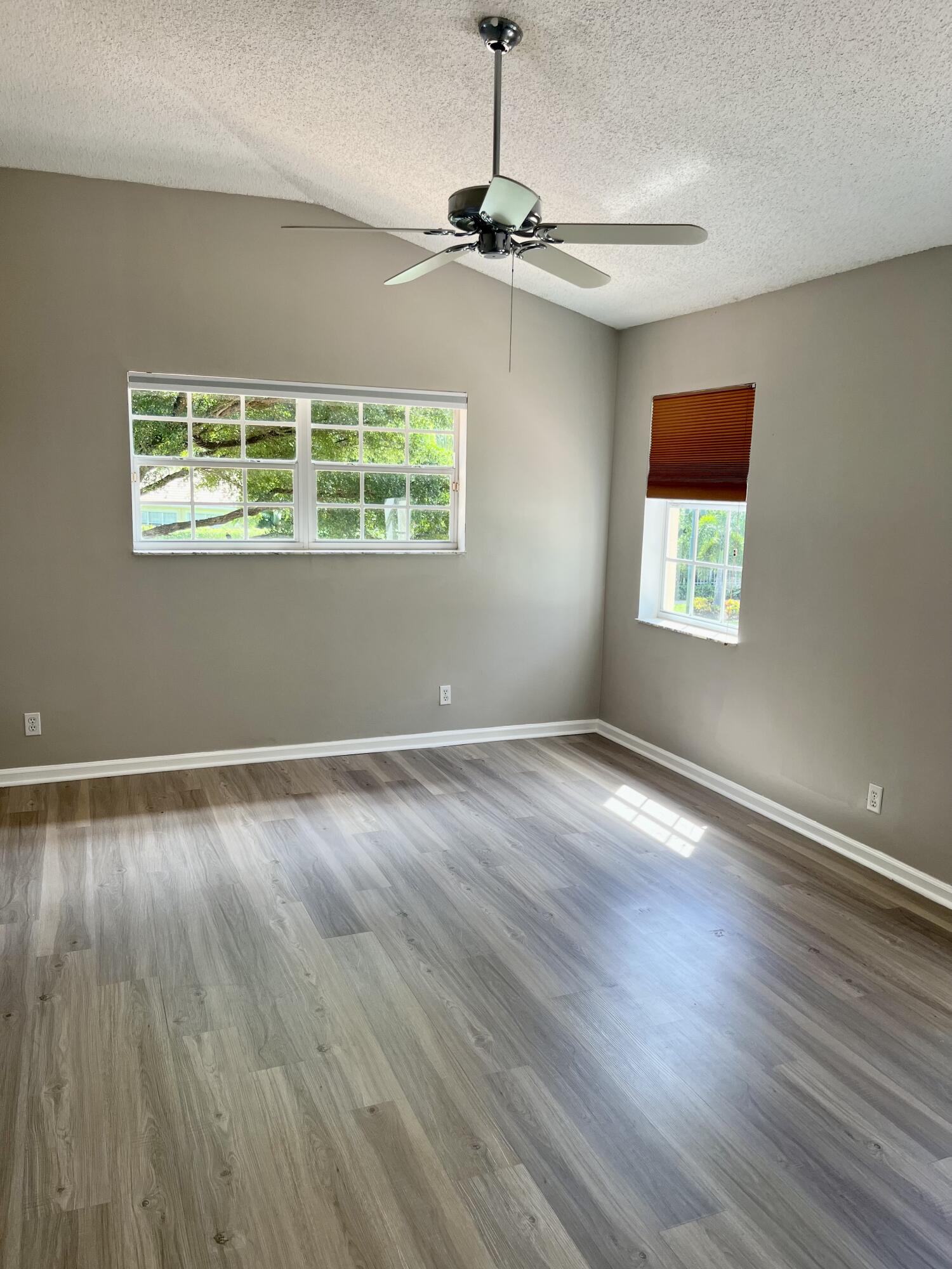 17262 Boca Club Boulevard, Unit 2407 Boca Raton, FL 33487 - Photo 14 of 25 a view of a room with a window and wooden floor