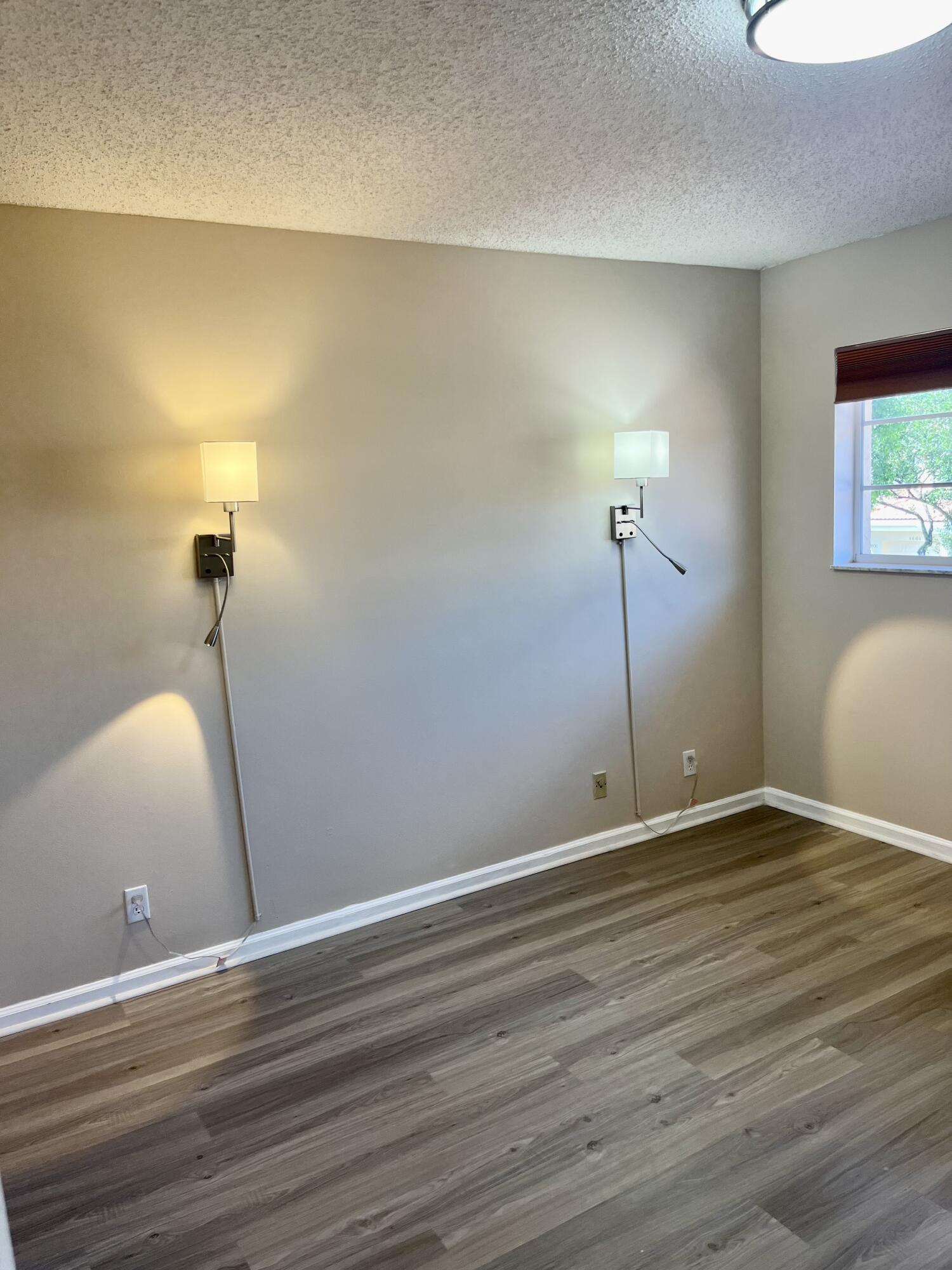 17262 Boca Club Boulevard, Unit 2407 Boca Raton, FL 33487 - Photo 20 of 25 a view of a room with wooden floor