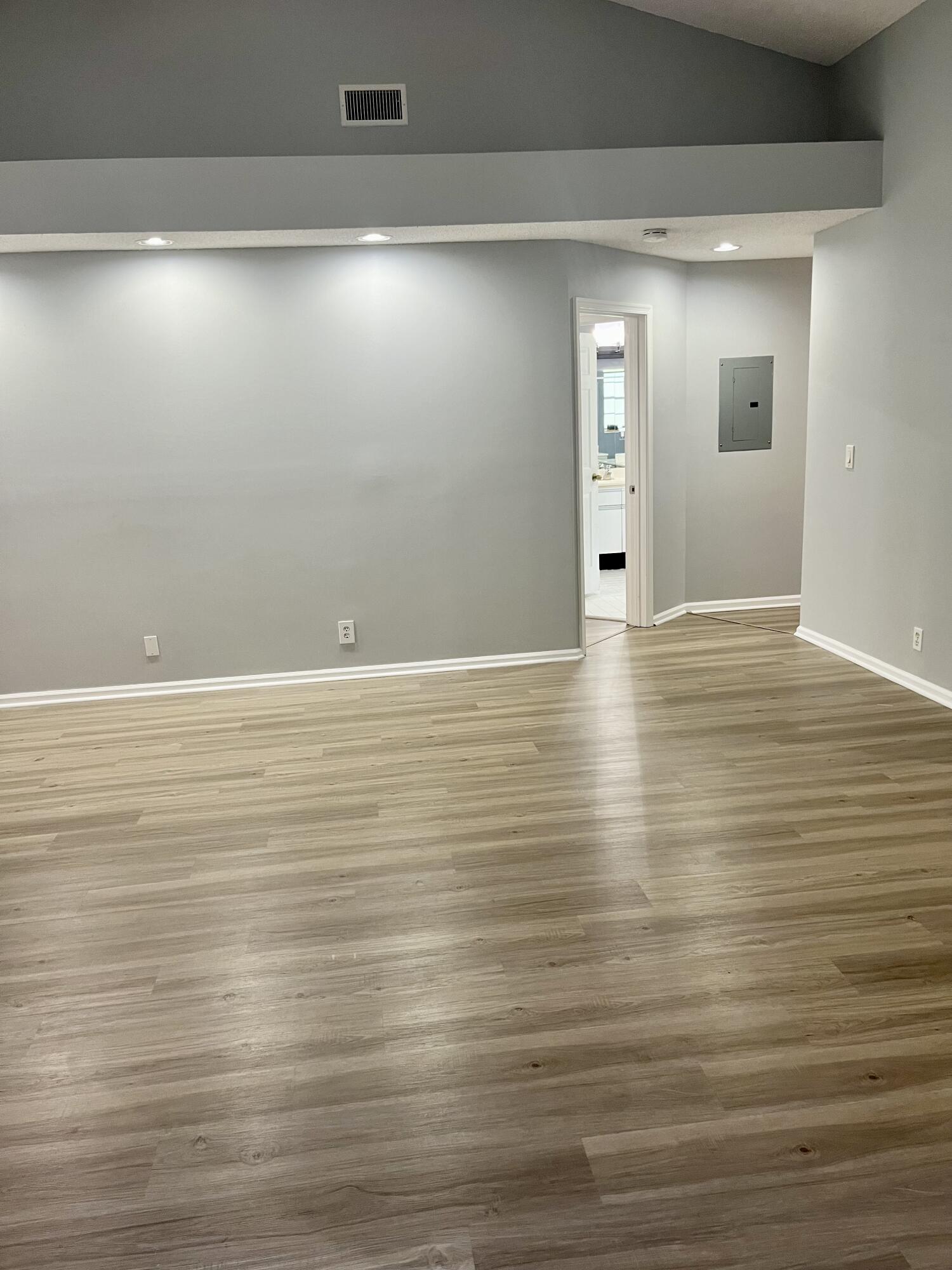 17262 Boca Club Boulevard, Unit 2407 Boca Raton, FL 33487 - Photo 6 of 25 a view of an empty room and wooden floor