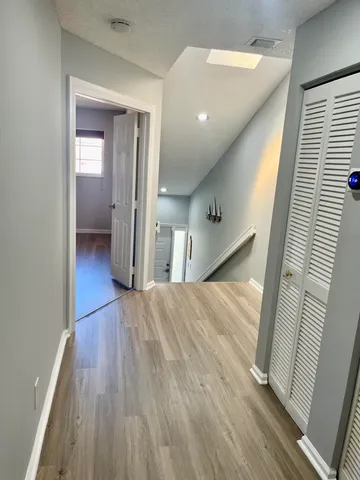 a kitchen with a sink stove and refrigerator