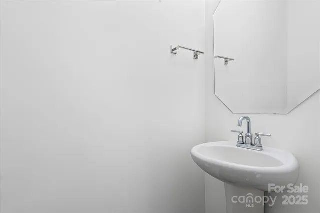 a sink with a mirror