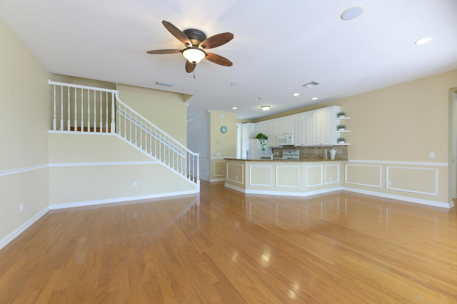 244 Barbados Drive Jupiter, FL 33458 - Photo 17 of 51 a view of an empty room with a window and wooden floor