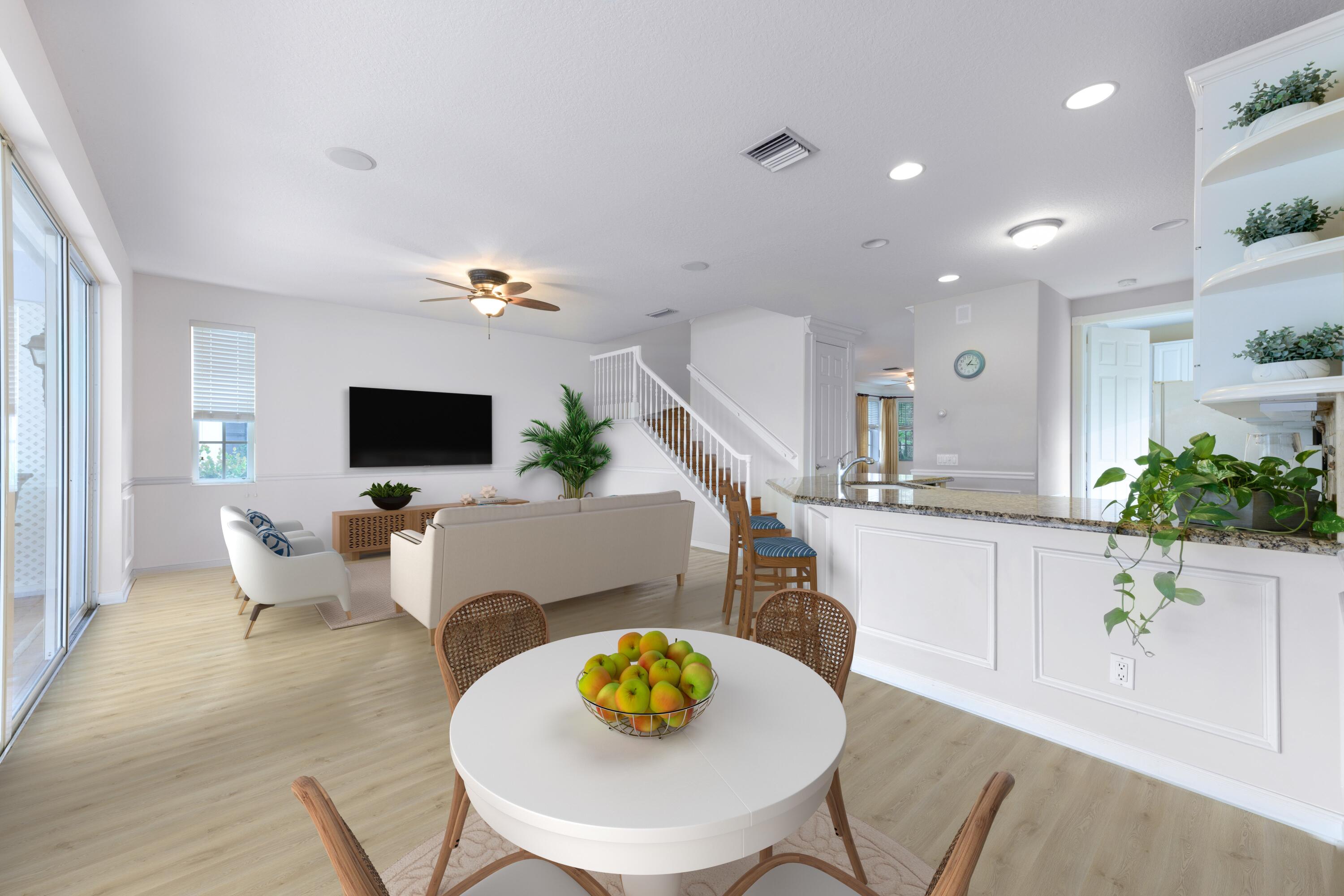 244 Barbados Drive Jupiter, FL 33458 - Photo 21 of 51 a living room with furniture and a flat screen tv