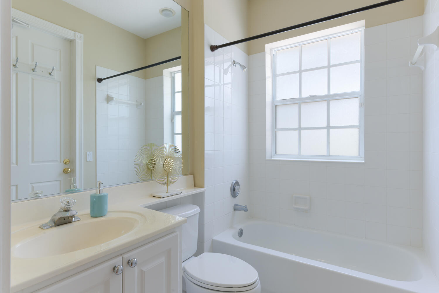 244 Barbados Drive Jupiter, FL 33458 - Photo 23 of 51 a bathroom with a sink toilet and shower