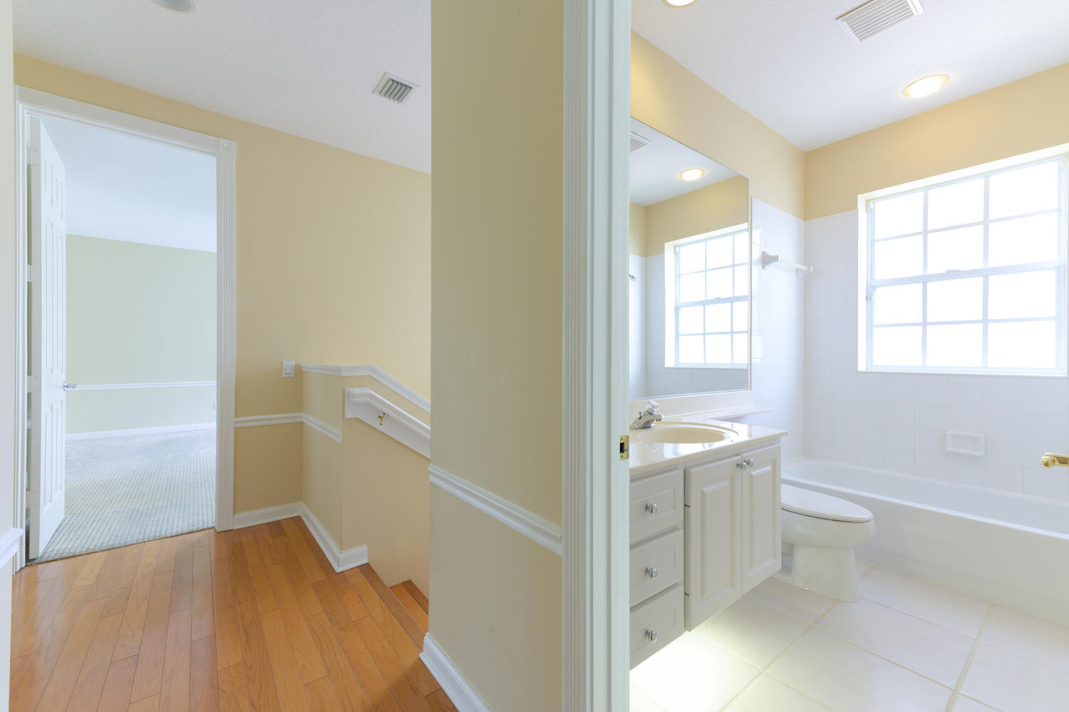 244 Barbados Drive Jupiter, FL 33458 - Photo 29 of 51 a bathroom with a sink a toilet and a bathtub