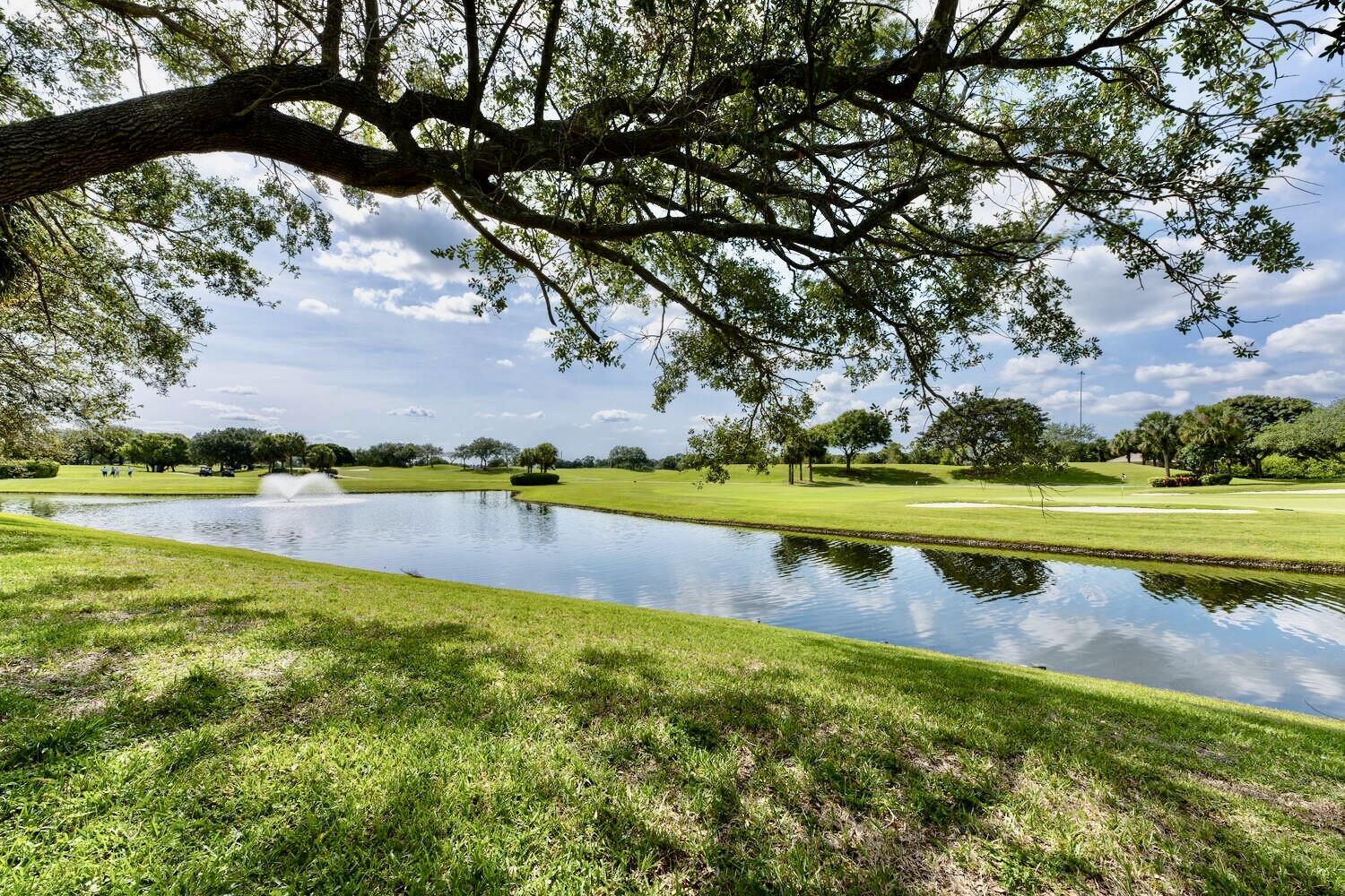 244 Barbados Drive Jupiter, FL 33458 - Photo 10 of 51 a view of a swimming pool and an outdoor space