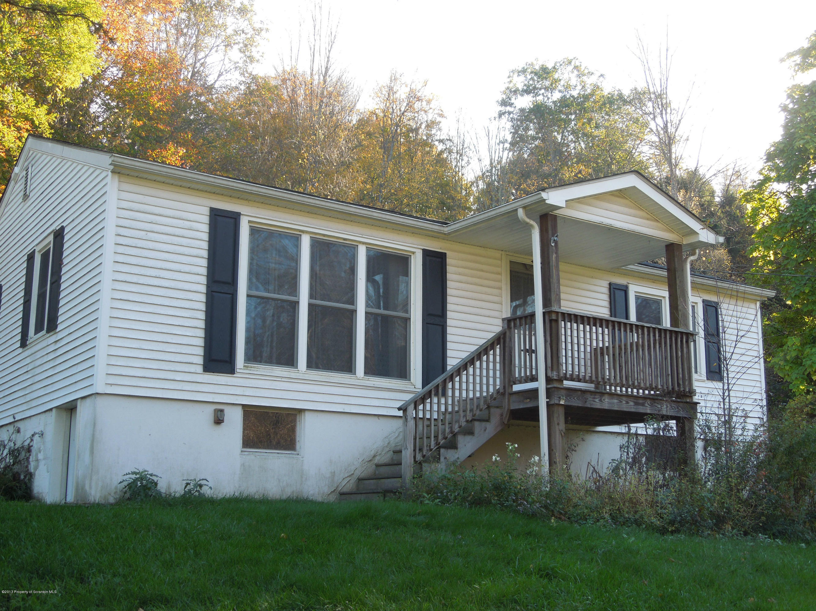 930 West Avery Station Road Factoryville, PA 18419 - Photo 1 of 12 a view of front a house with a yard