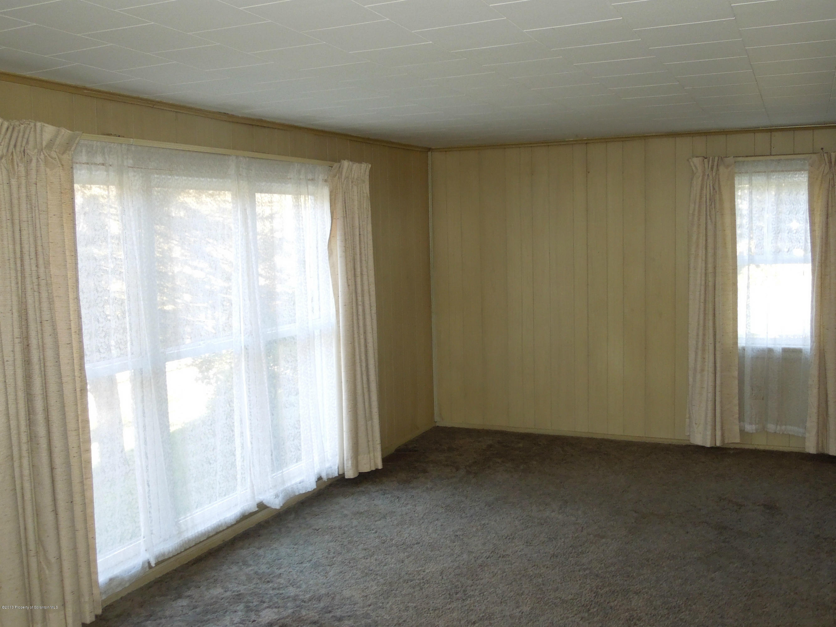 930 West Avery Station Road Factoryville, PA 18419 - Photo 3 of 12 a view of an empty room and window