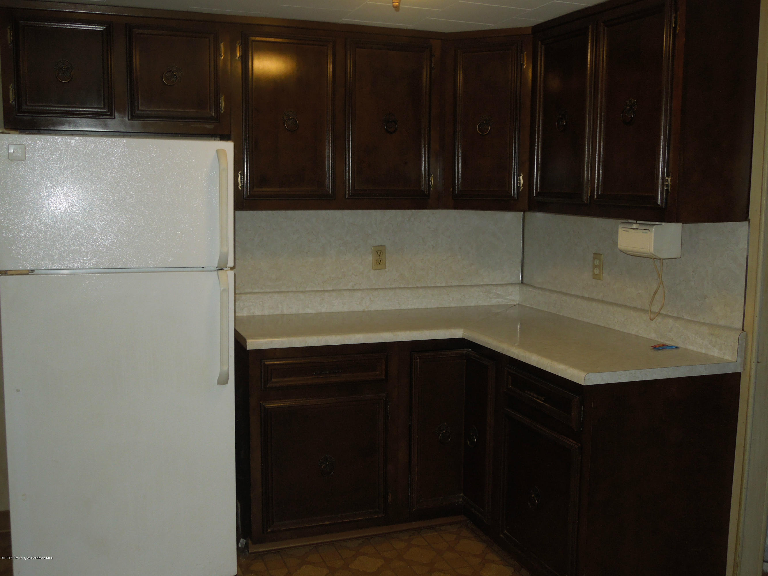 930 West Avery Station Road Factoryville, PA 18419 - Photo 4 of 12 a kitchen with a sink and cabinets