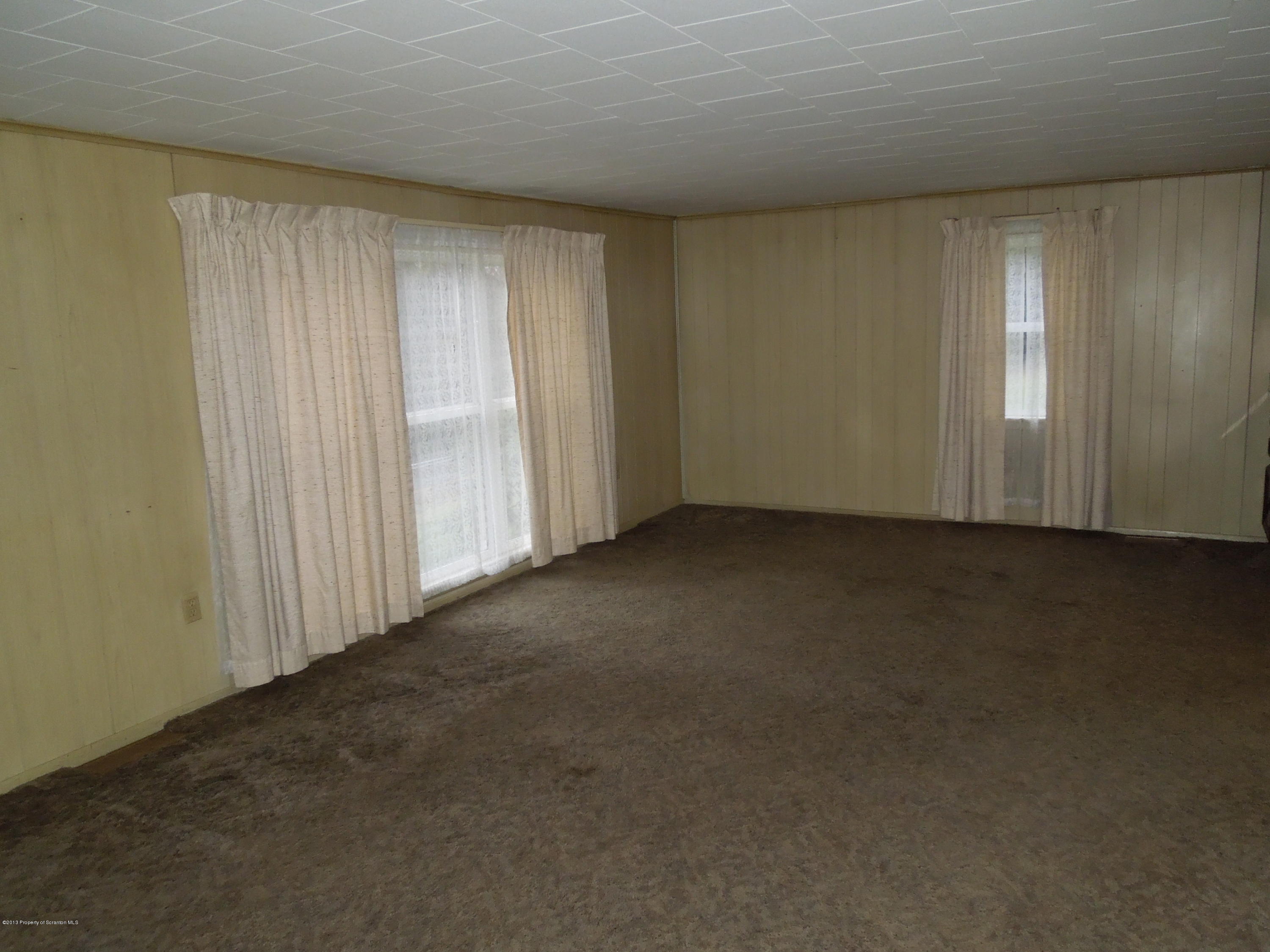 930 West Avery Station Road Factoryville, PA 18419 - Photo 8 of 12 an empty room with a window