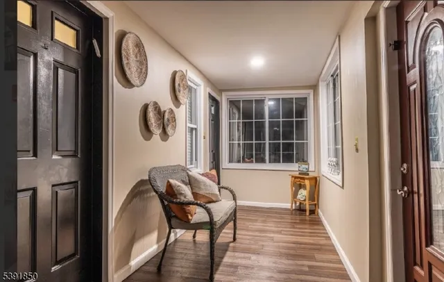 a view of a balcony with chairs