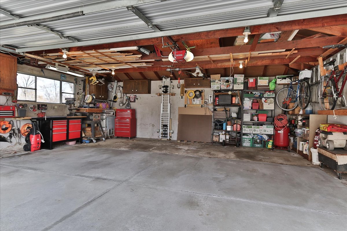 1335 Gentry Road Hoffman Estates, IL 60169 - Photo 28 of 33 a view of a storage room with a lot of stuff