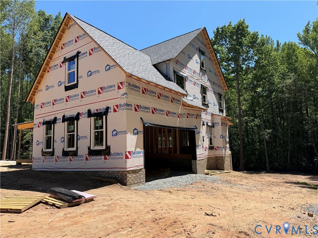 15426 Beaver Dam Road Montpelier, VA 23192 - Photo 2 of 19 a front view of a house with a yard