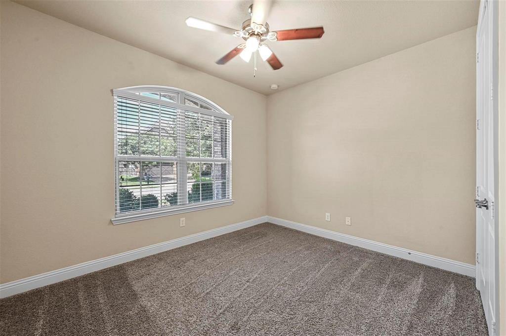 602 Whitetail Road Euless, TX 76039 - Photo 14 of 28 a view of an empty room with a window