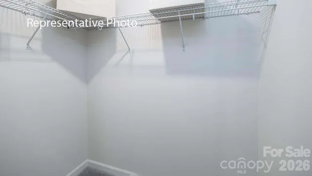 a view of a room with racks on the wall