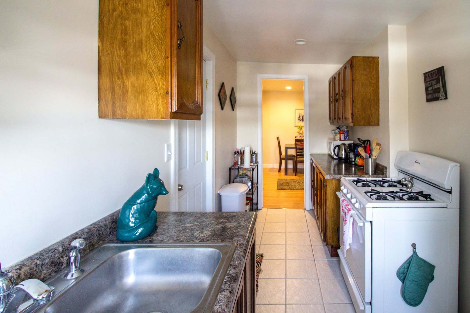 526 South York Street, Unit B Elmhurst, IL 60126 - Photo 13 of 15 a kitchen with stainless steel appliances granite countertop a sink and a stove