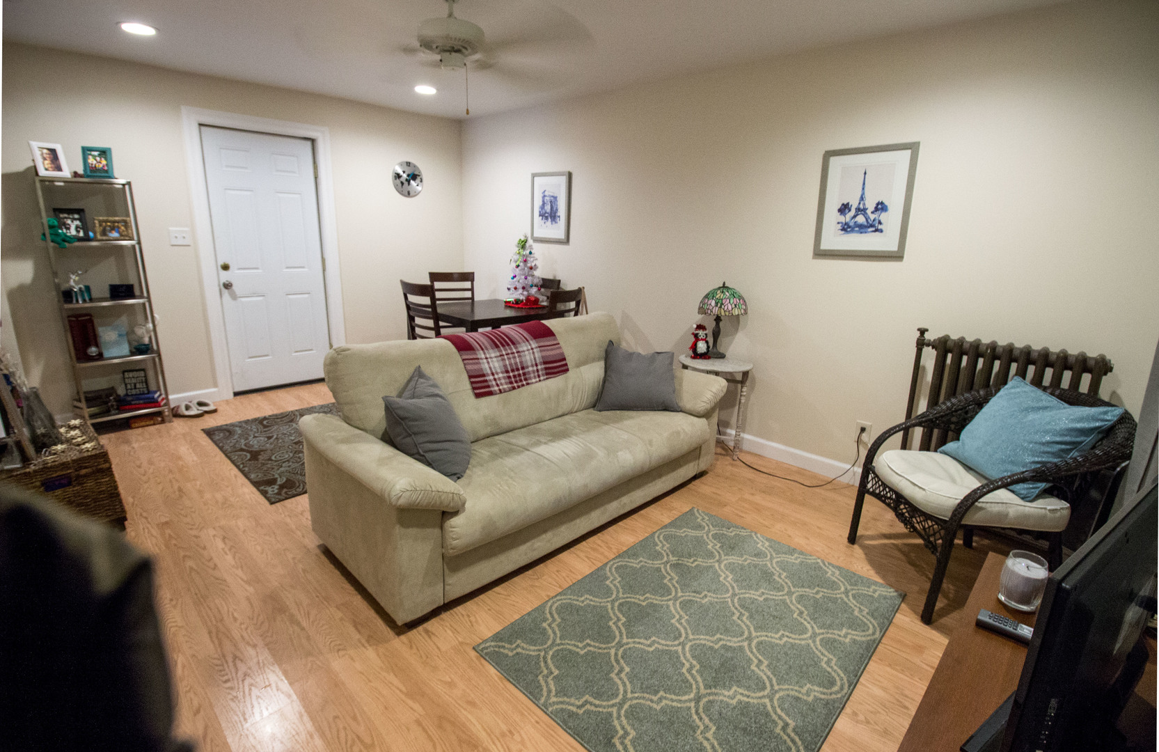 526 South York Street, Unit B Elmhurst, IL 60126 - Photo 4 of 15 a living room with furniture and a flat screen tv
