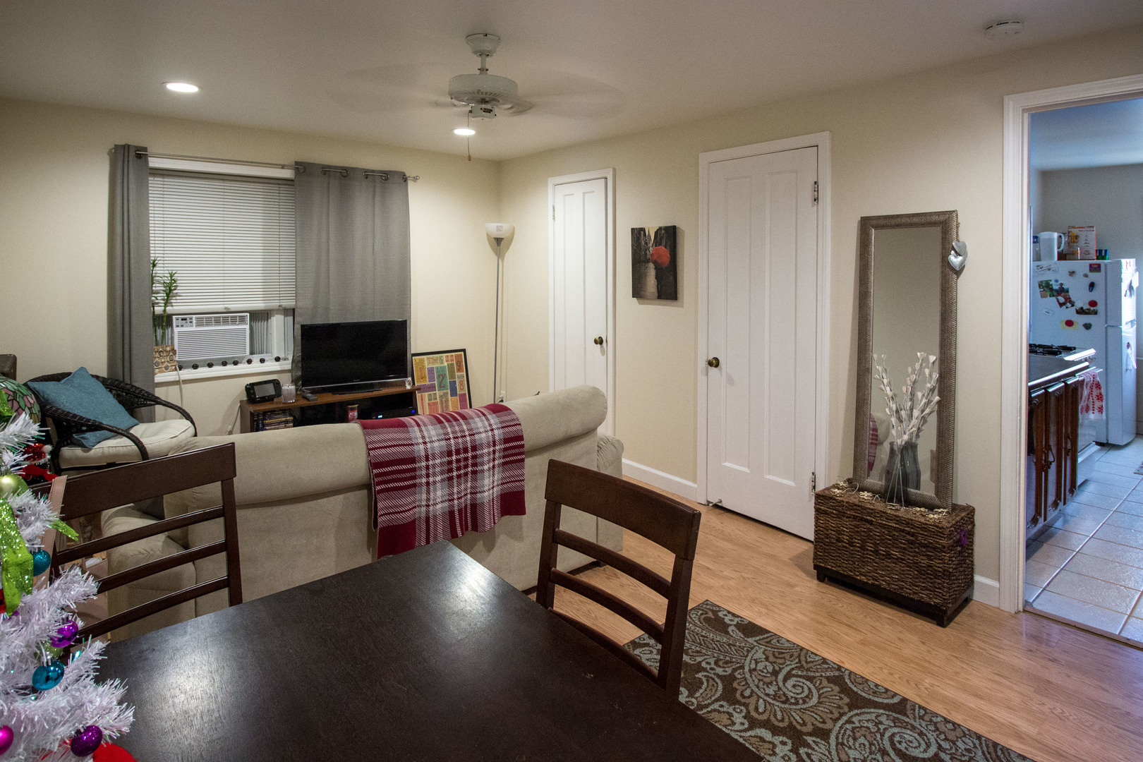 526 South York Street, Unit B Elmhurst, IL 60126 - Photo 5 of 15 a living room with furniture and a flat screen tv
