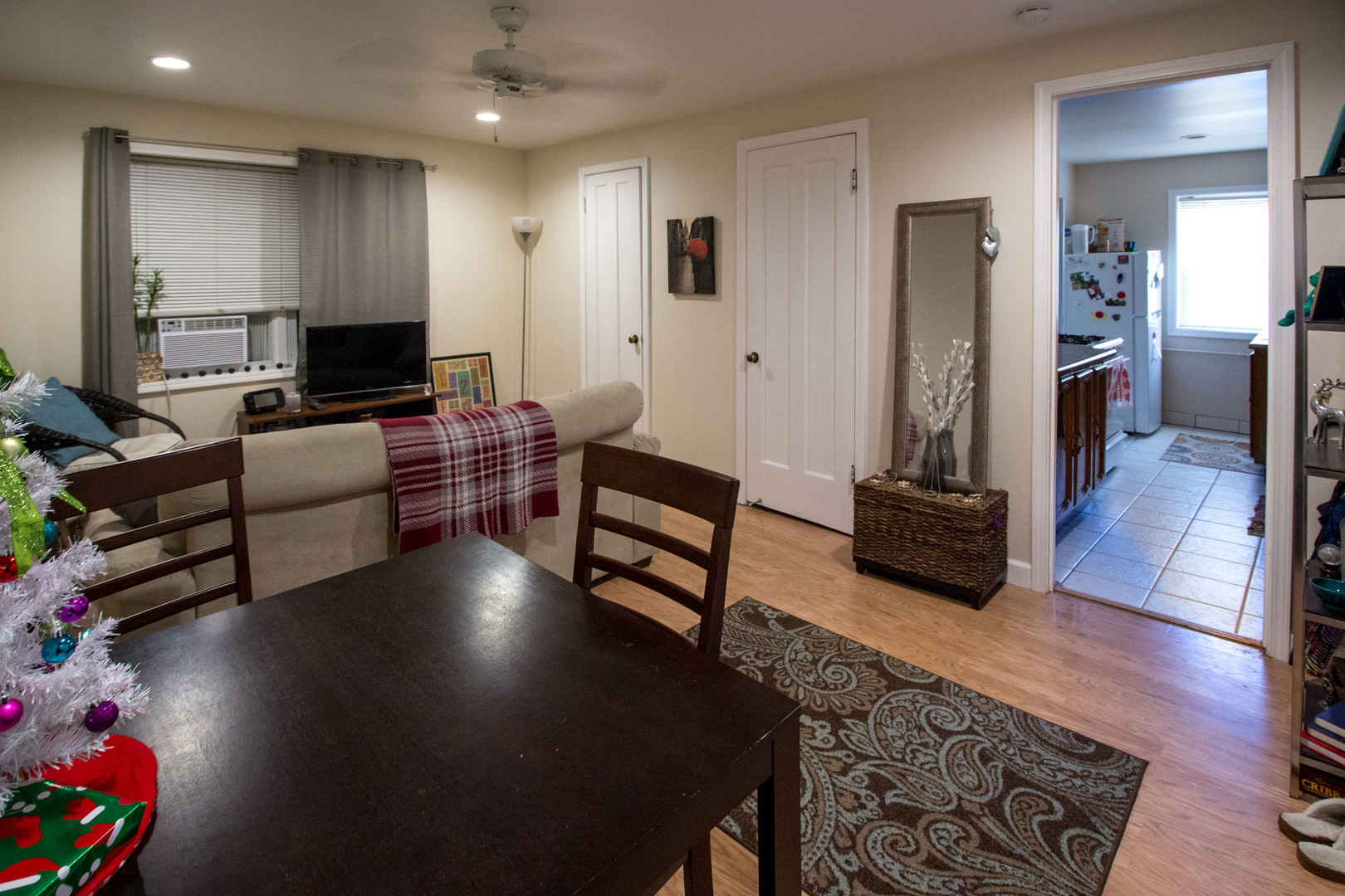 526 South York Street, Unit B Elmhurst, IL 60126 - Photo 6 of 15 a living room with furniture and a flat screen tv