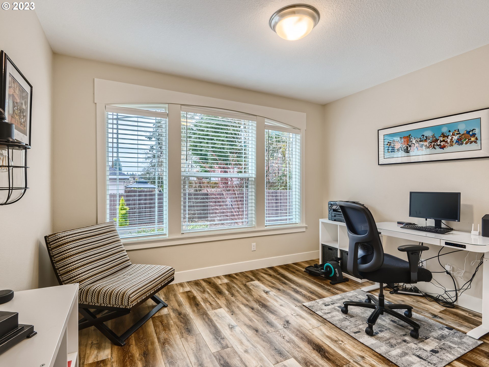 11469 Southwest Gabriel Street Tigard, OR 97224 - Photo 15 of 25 a view of a workspace with furniture and a window