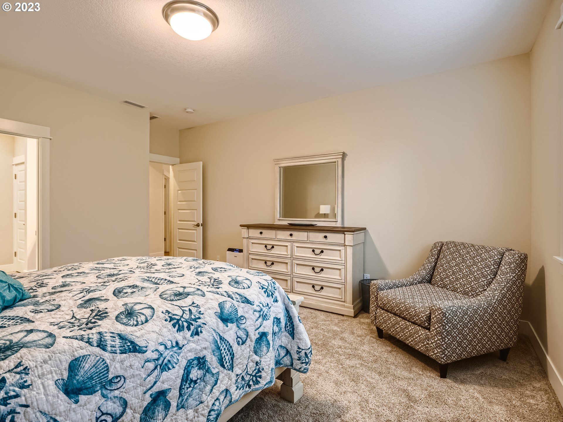 11469 Southwest Gabriel Street Tigard, OR 97224 - Photo 18 of 25 a bedroom with a bed and a television
