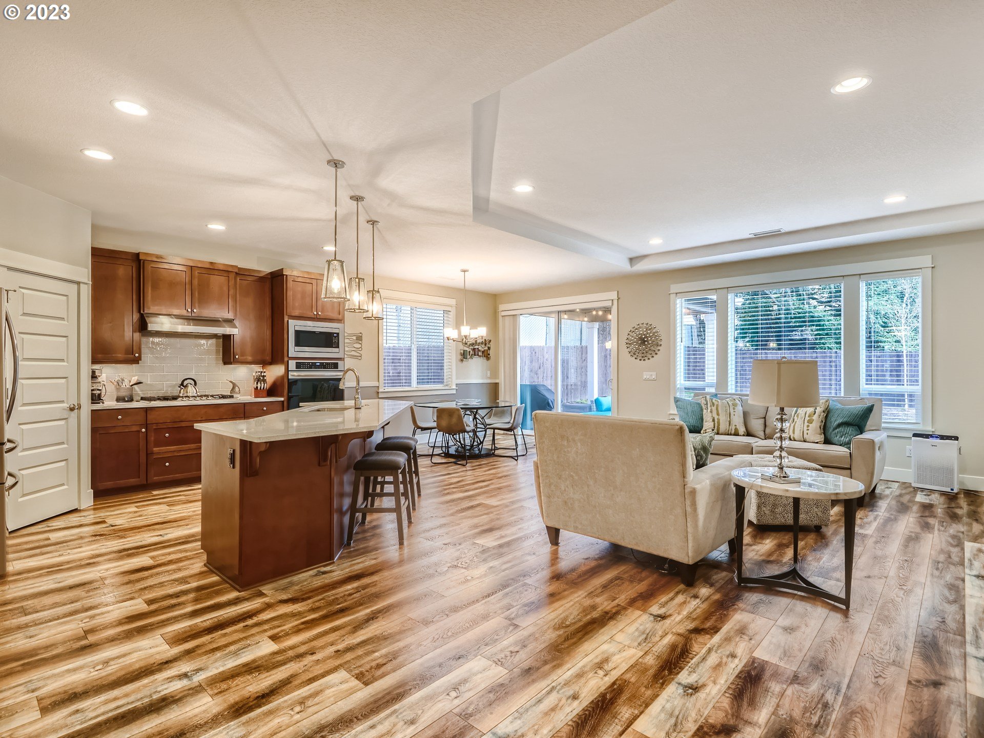 11469 Southwest Gabriel Street Tigard, OR 97224 - Photo 6 of 25 a living room with furniture and kitchen view