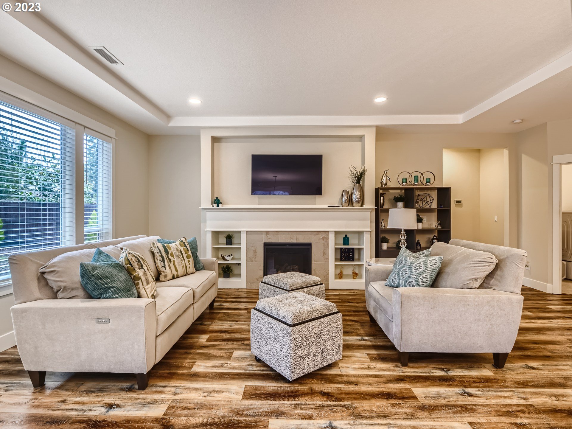 11469 Southwest Gabriel Street Tigard, OR 97224 - Photo 7 of 25 a living room with furniture and a fireplace